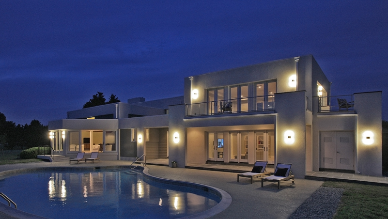 Pool and outdoor entertaining area of a renovated modern home on the Maryland Eastern Shore