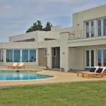 Pool and outdoor entertaining area of renovated modern home on the Maryland Eastern Shore